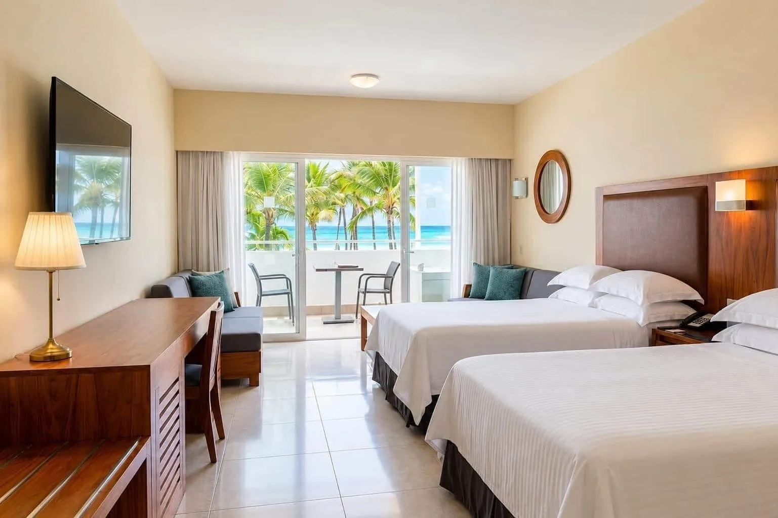 Superior Oceanfront room with two beds and balcony view at Occidental Punta Cana.