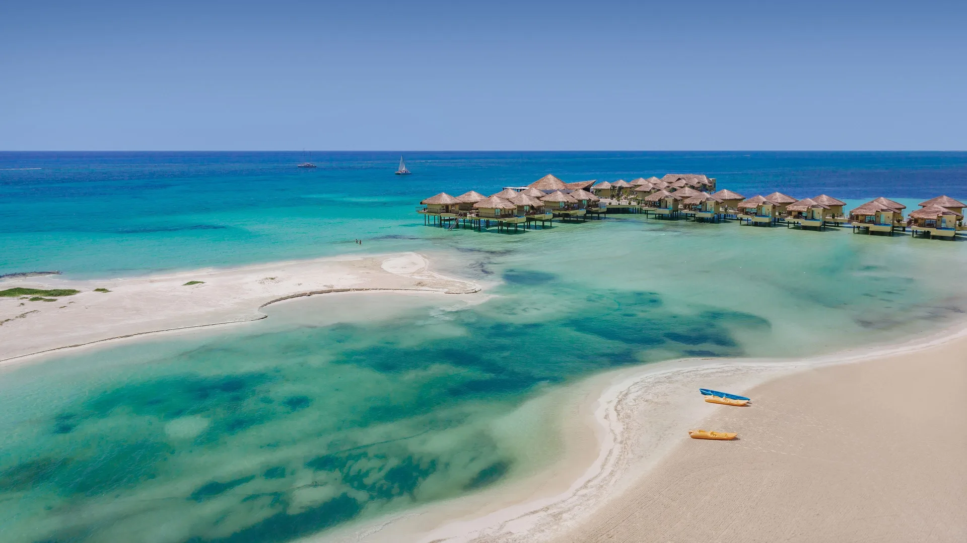 Palafitos Overwater Bungalows luxury adults-only resort with overwater suites and Caribbean views