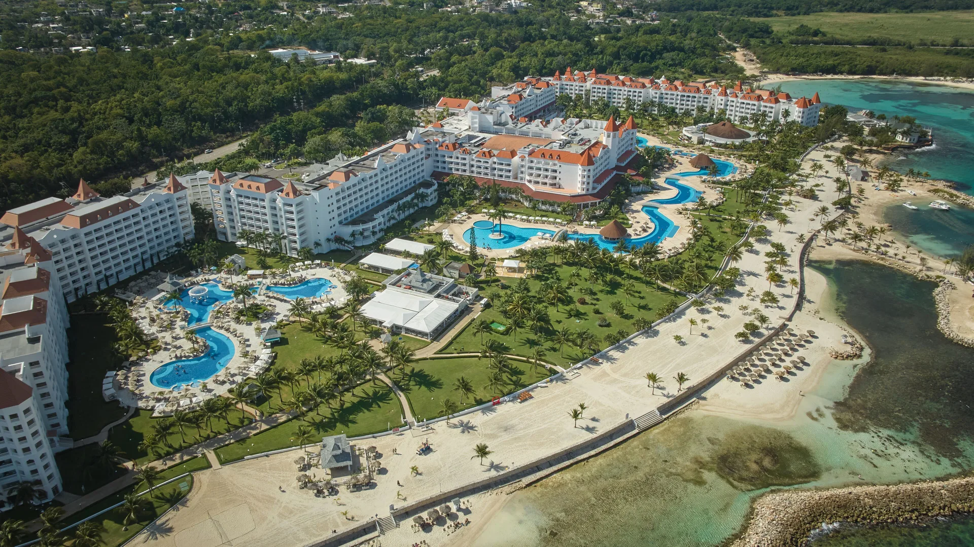 Bahia Principe Luxury Runaway Bay adults-only all-inclusive resort with beachfront pools and tropical grounds