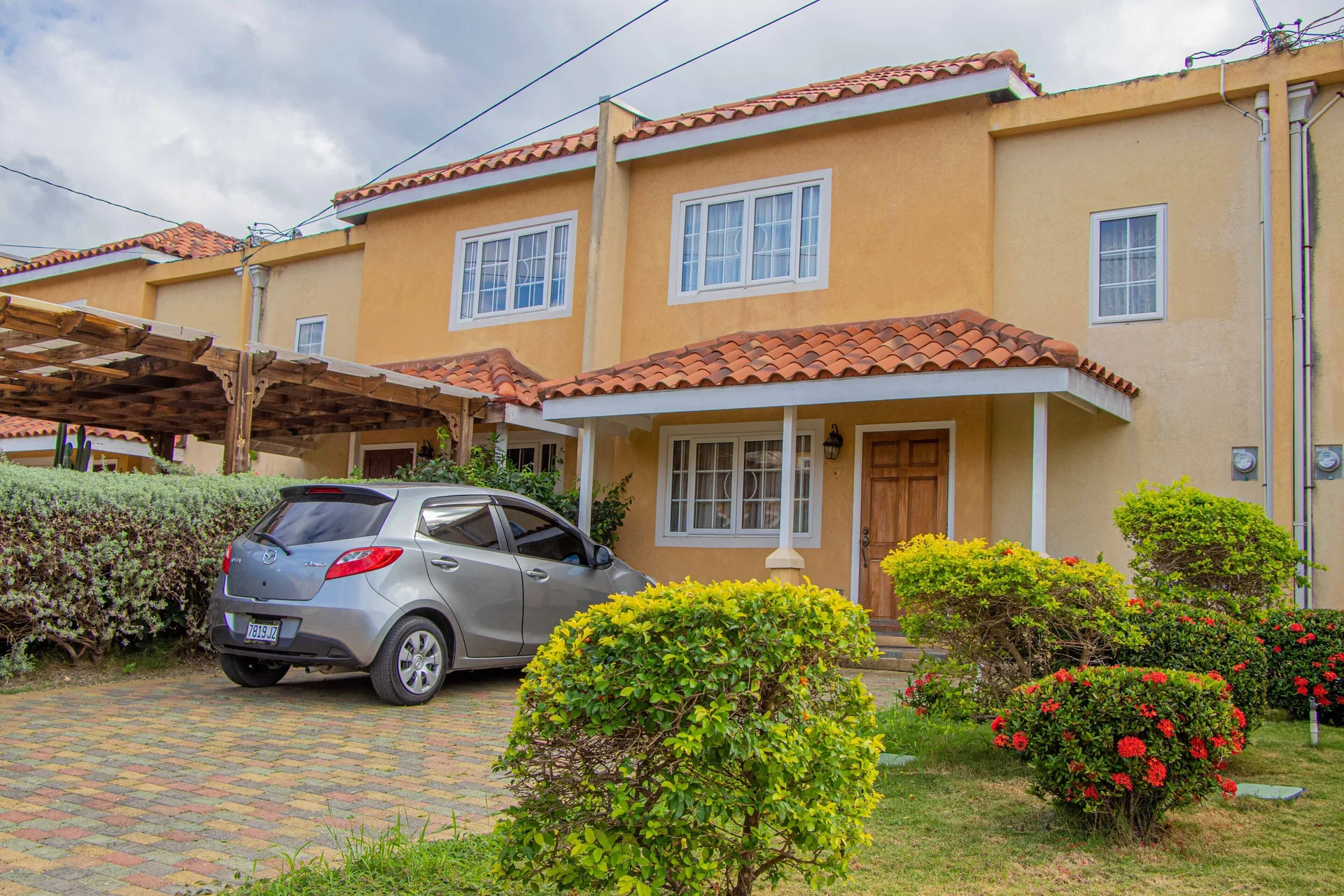 HOLIDAYS AT MANGO WALK COUNTRY CLUB Jamaica apartment stay with pool access and hillside views