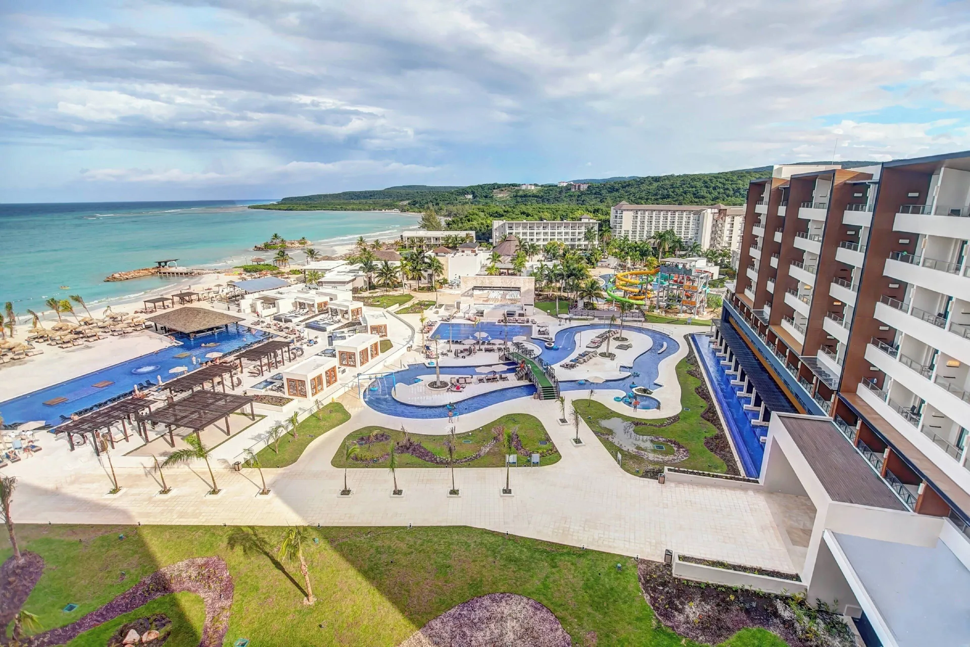 Royalton Blue Waters Montego Bay all-inclusive beachfront resort with family amenities and modern pools