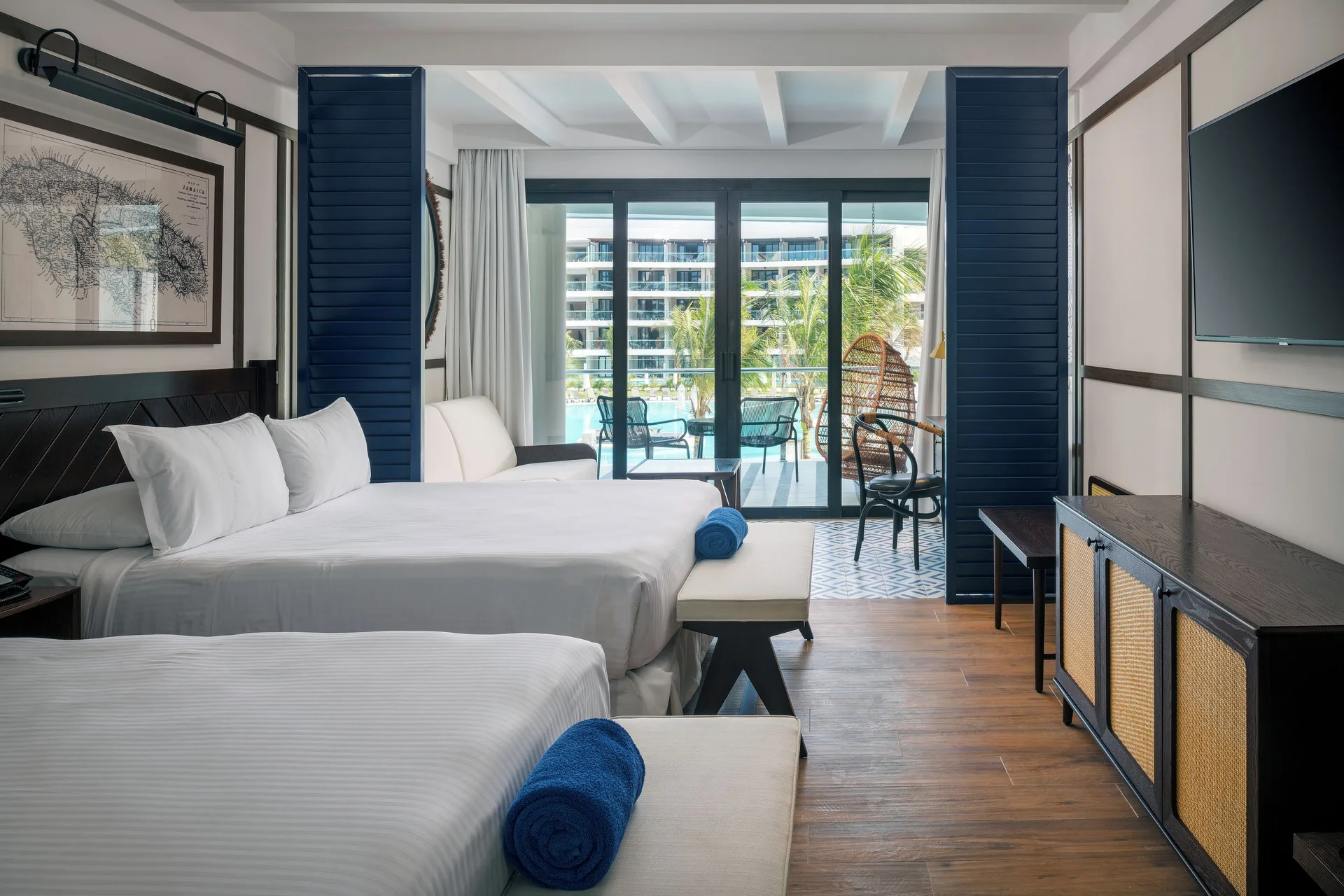 Junior Suite Pool View with two beds and balcony at Ocean Coral Spring.
