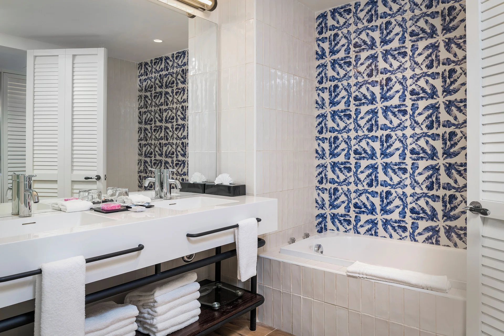 Junior Suite Waterpark bathroom with vanity and bathtub at Ocean Coral Spring.
