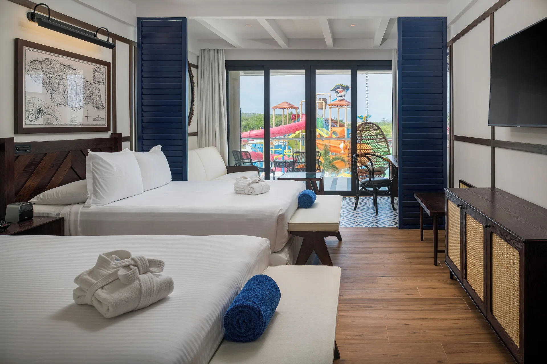 Junior Suite Waterpark room with two beds and balcony view at Ocean Coral Spring.