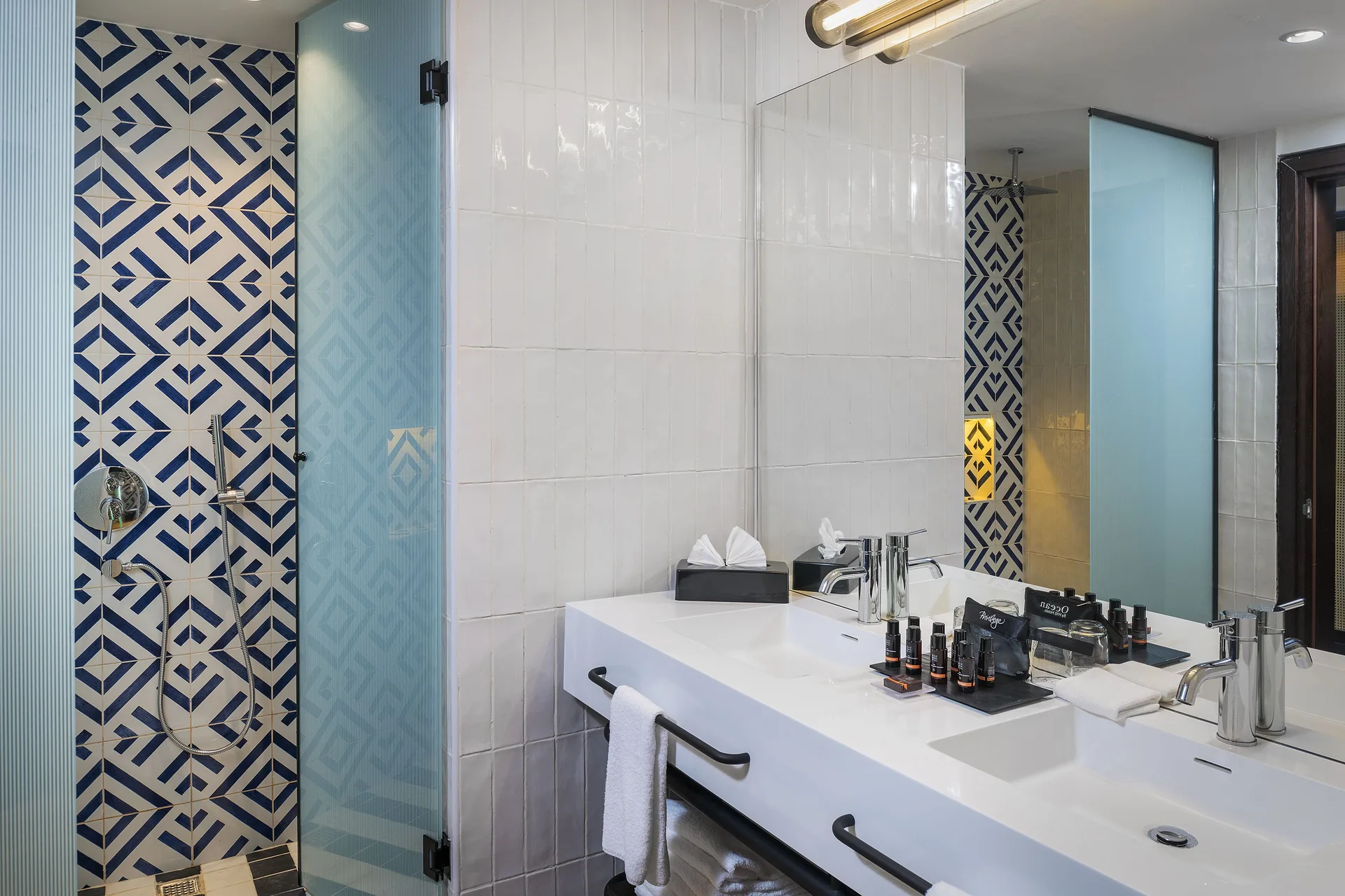 Privilege Junior Suite Nature View bathroom with double vanity at Ocean Coral Spring.