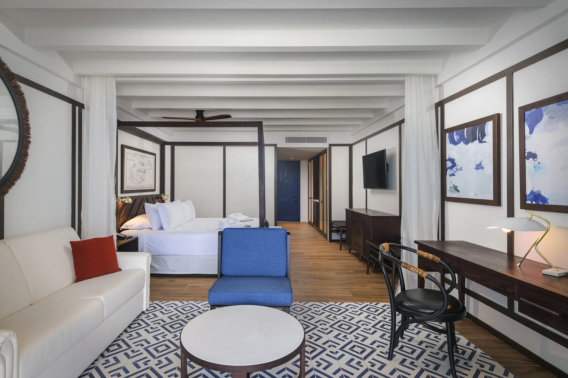 Privilege Junior Suite Nature View lounge and king bed area at Ocean Coral Spring.