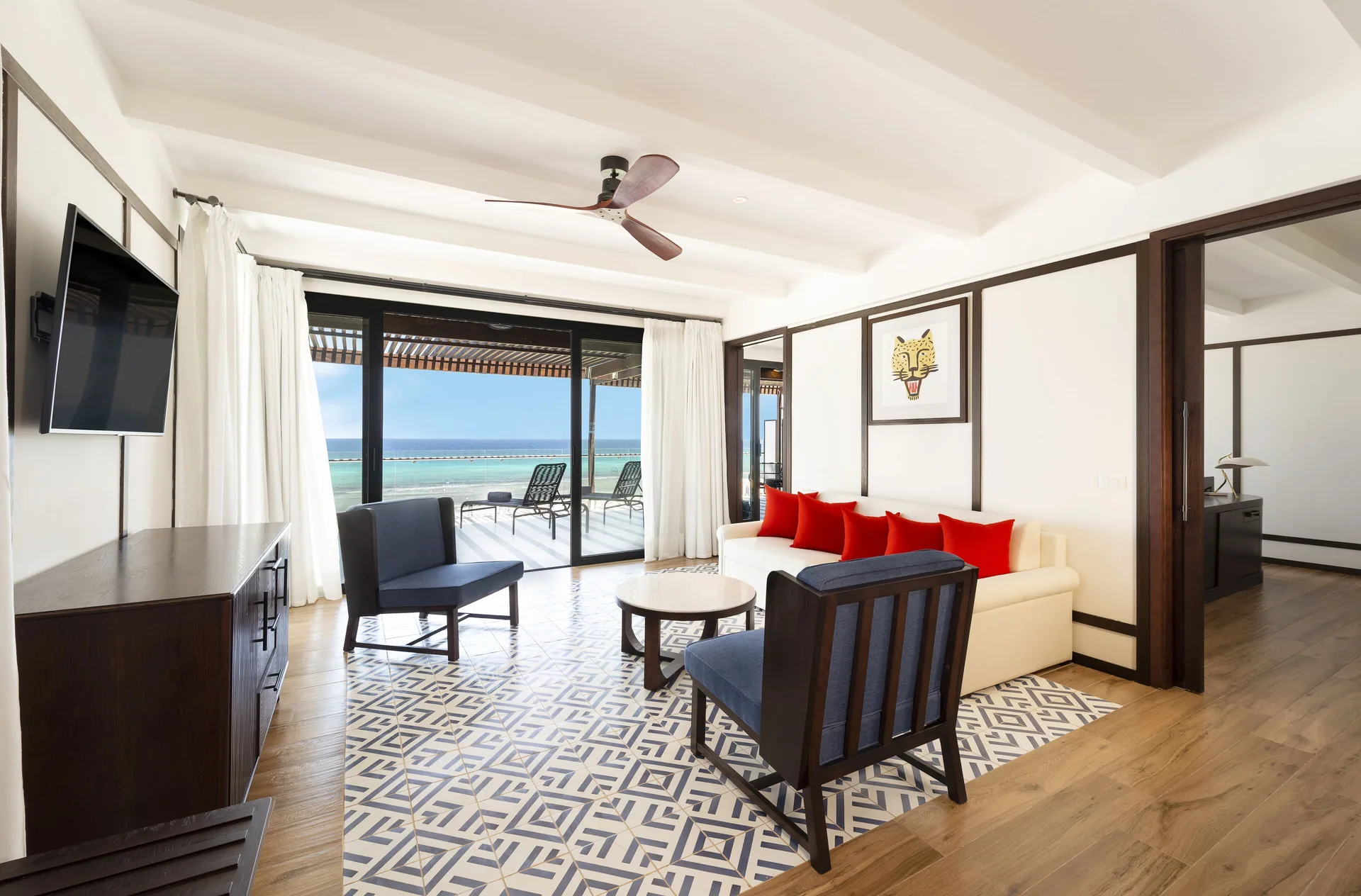 Privilege Master Suite living room opening to an oceanfront terrace at Ocean Coral Spring.