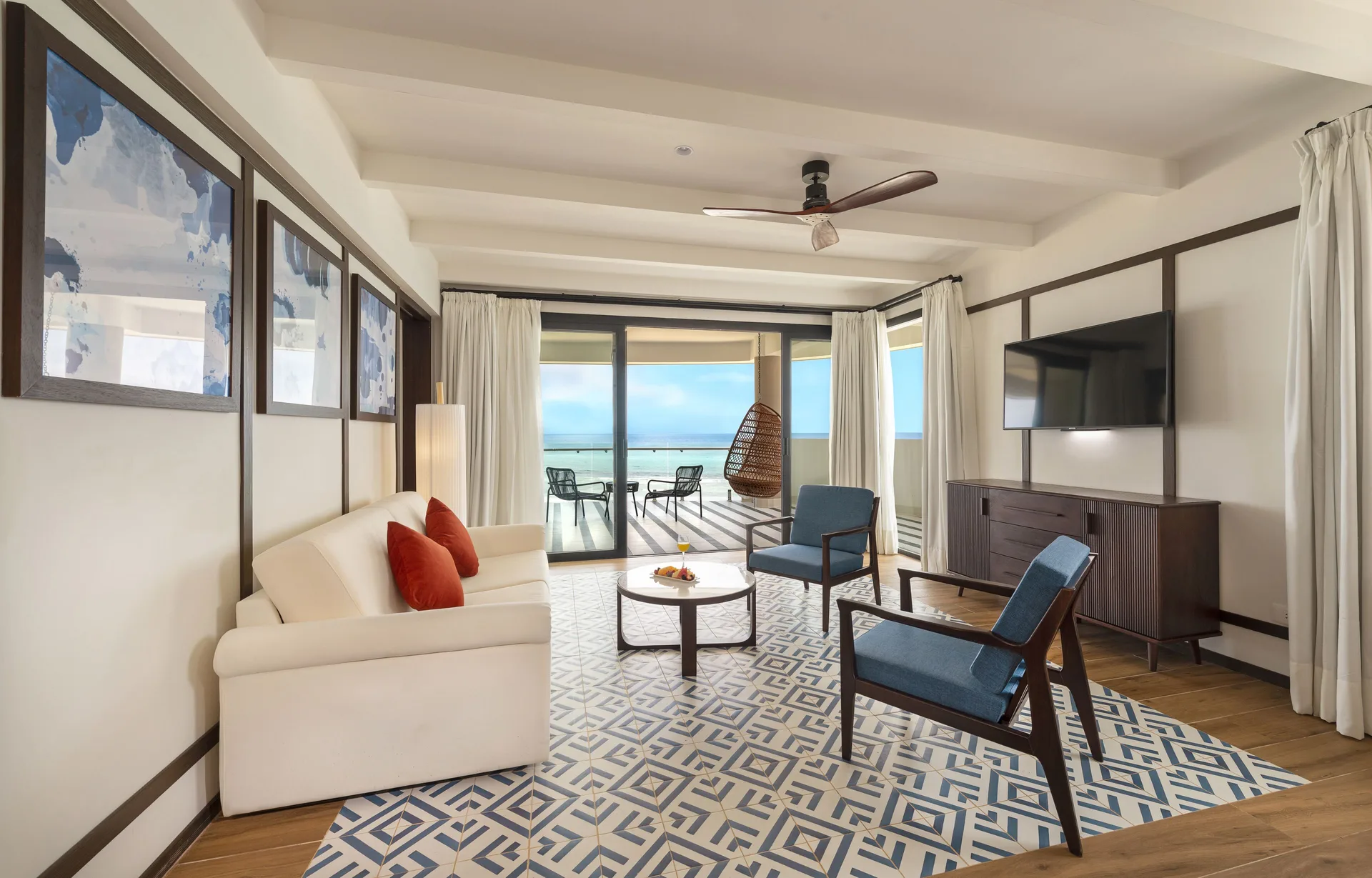 Privilege Master Suite sitting area with balcony seating and sea view at Ocean Coral Spring.