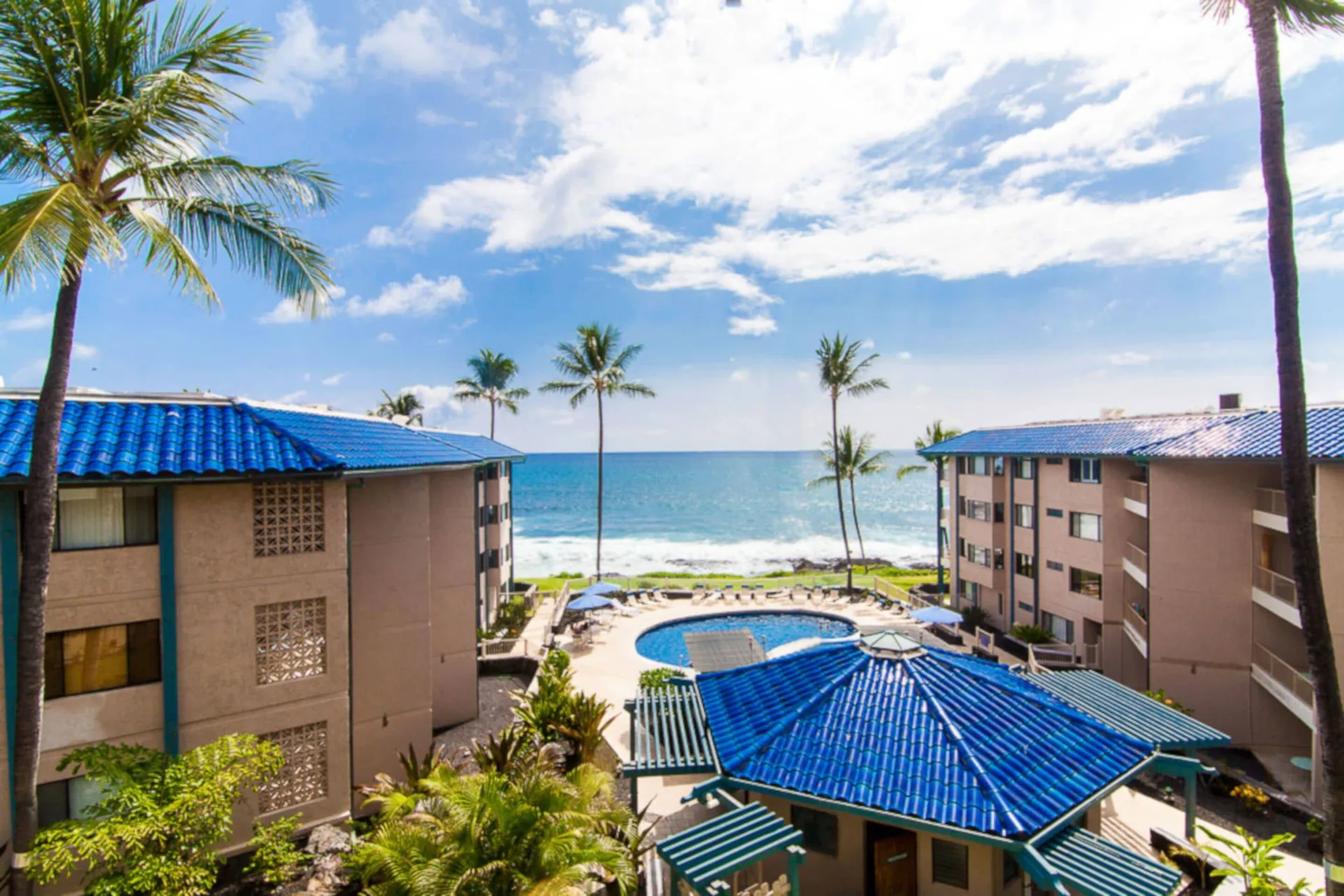Kona Reef Resort oceanfront condominium property near Kailua-Kona with coastal views and pool area
