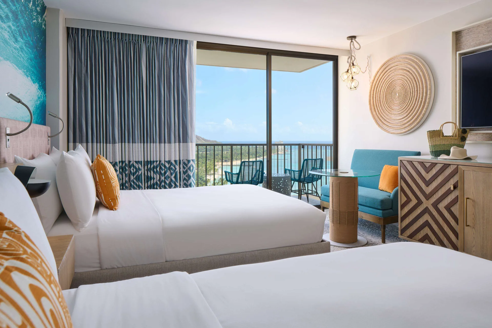 Mobility accessible ocean view room with two beds and balcony at OUTRIGGER Waikiki Beachcomber Hotel.