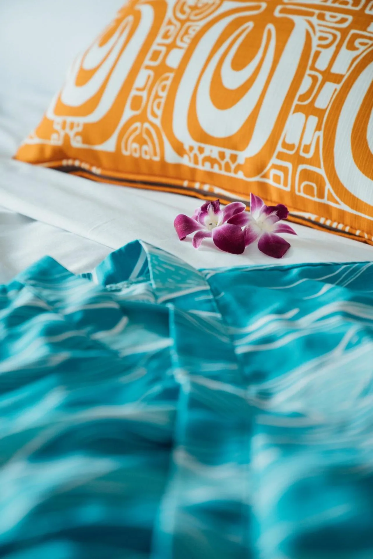 Close-up of bed accents in a Waikiki View room at OUTRIGGER Waikiki Beachcomber Hotel.