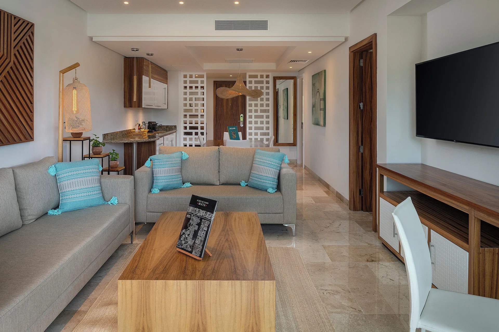 Living room seating in The Reserve Master Suite Nature View at Paradisus La Perla Riviera Maya.