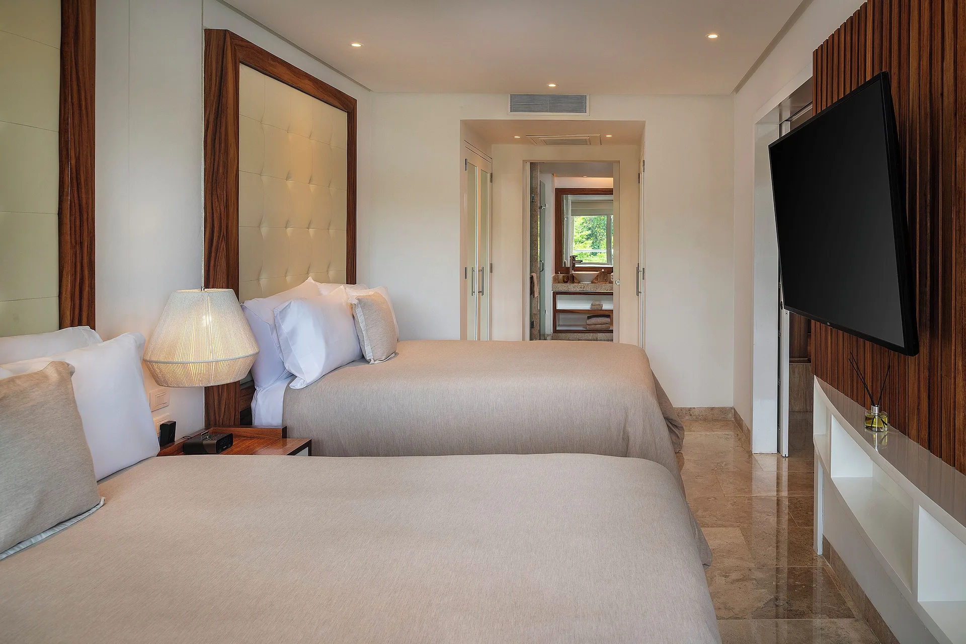 The Reserve Nature View suite two-bed bedroom at Paradisus La Perla Riviera Maya.