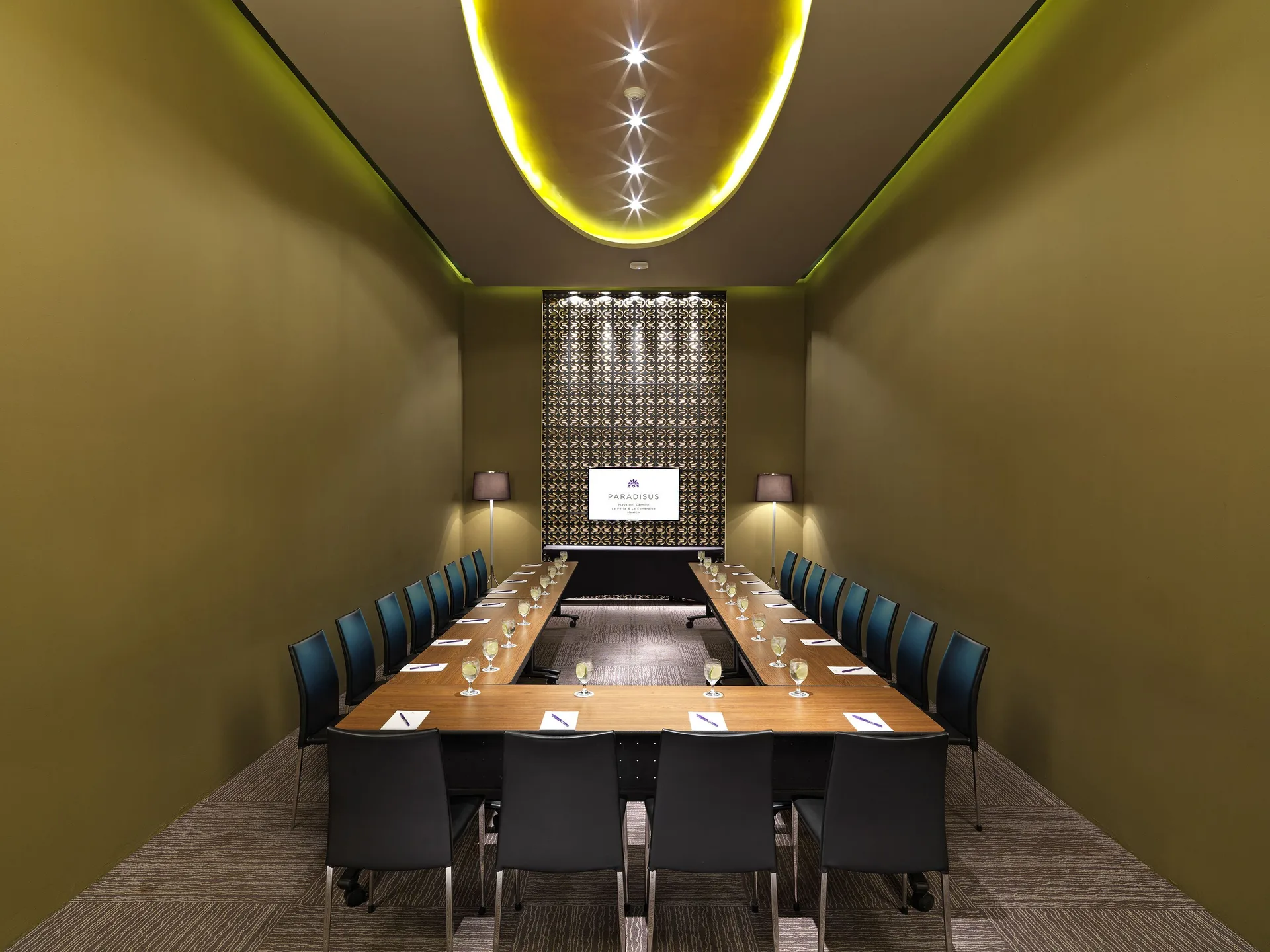 Boardroom with U-shaped table setup at Paradisus La Perla Riviera Maya.