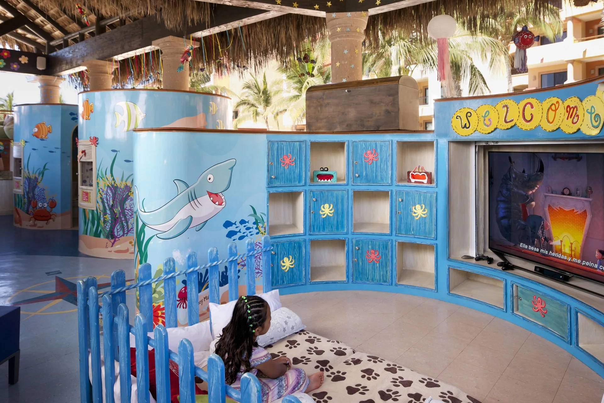 Ocean-themed kids' lounge with TV at Playa Grande Resort & Grand Spa.