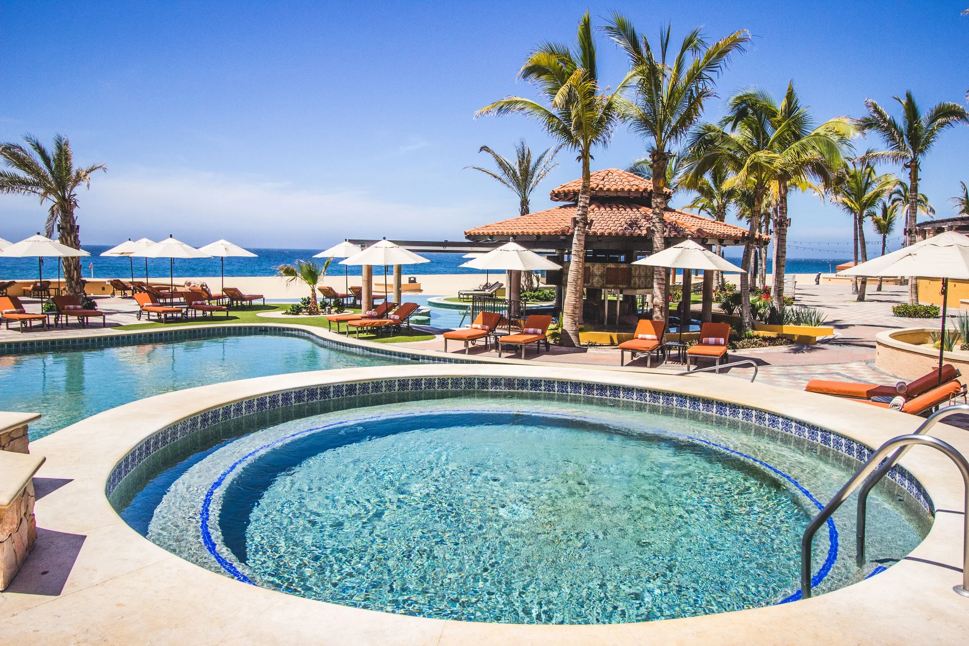 Round spa pool beside the oceanfront pool deck at Playa Grande Resort & Grand Spa.