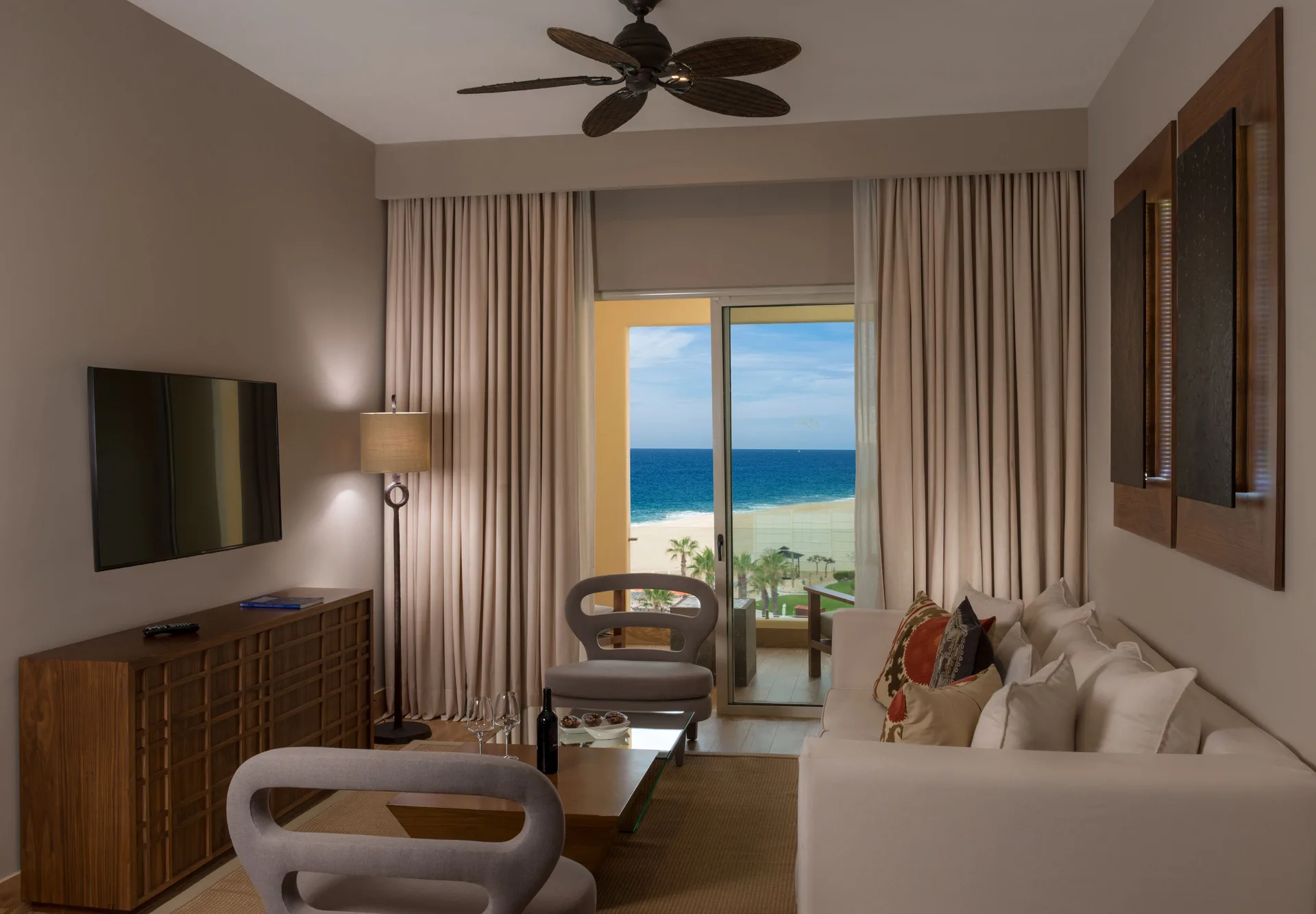 Towers Ocean View Suite living area at Pueblo Bonito Pacifica Golf & Spa Resort with balcony ocean view.