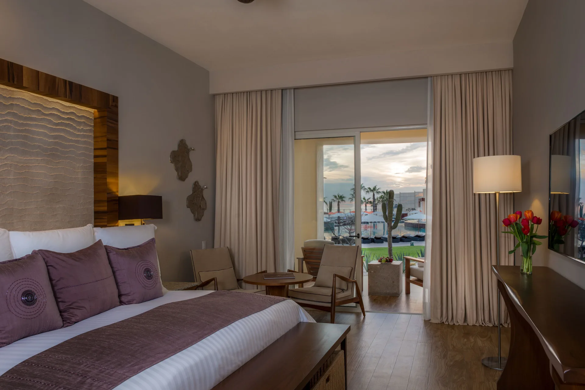 Towers Private Pool Suite king bedroom at Pueblo Bonito Pacifica Golf & Spa Resort with patio view.