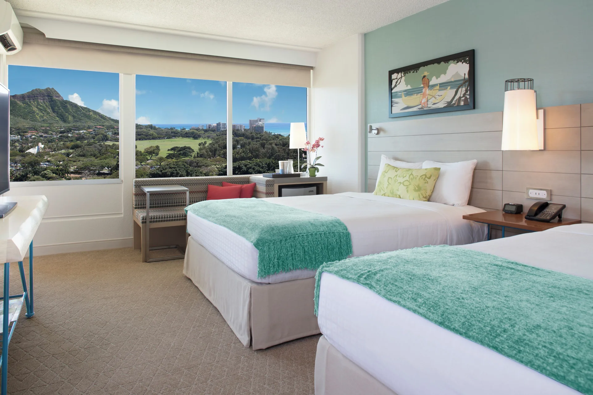 Two-bed guest room with Diamond Head view at Queen Kapiolani Hotel.