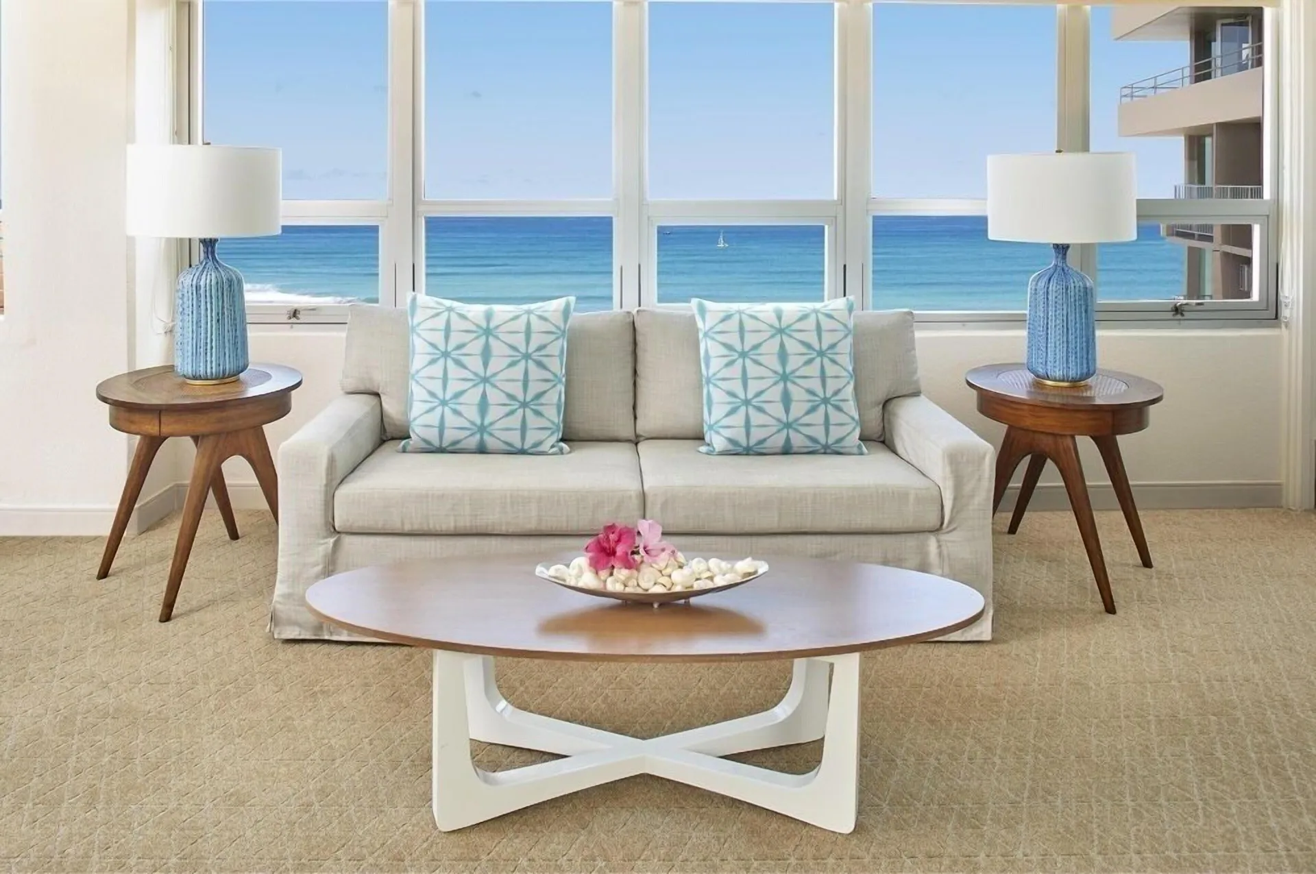 Penthouse ocean view suite sofa facing Waikiki water at Queen Kapiolani Hotel.