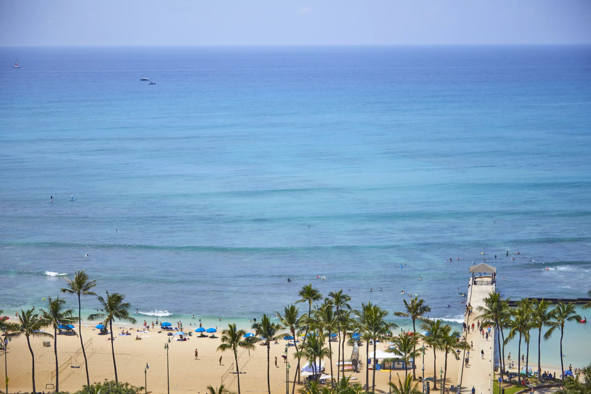 Sunny blue skies with Diamond Head views during ideal weather season in Waikiki