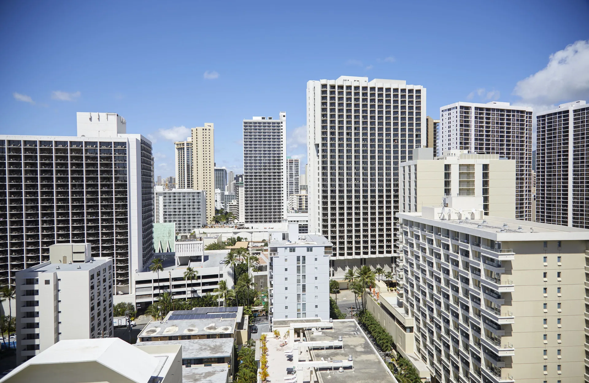 City high-rises seen from a Studio City View room at Queen Kapiolani Hotel.