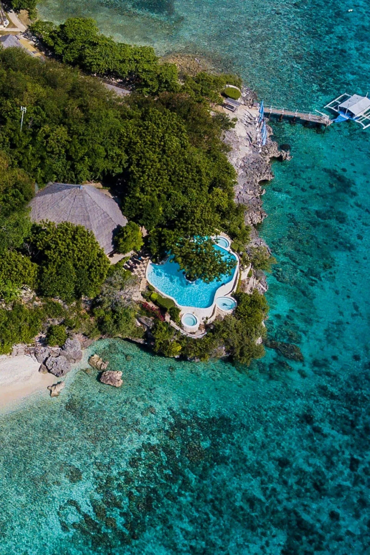 Bluewater Sumilon Island Resort private island resort with turquoise water and sandbar views