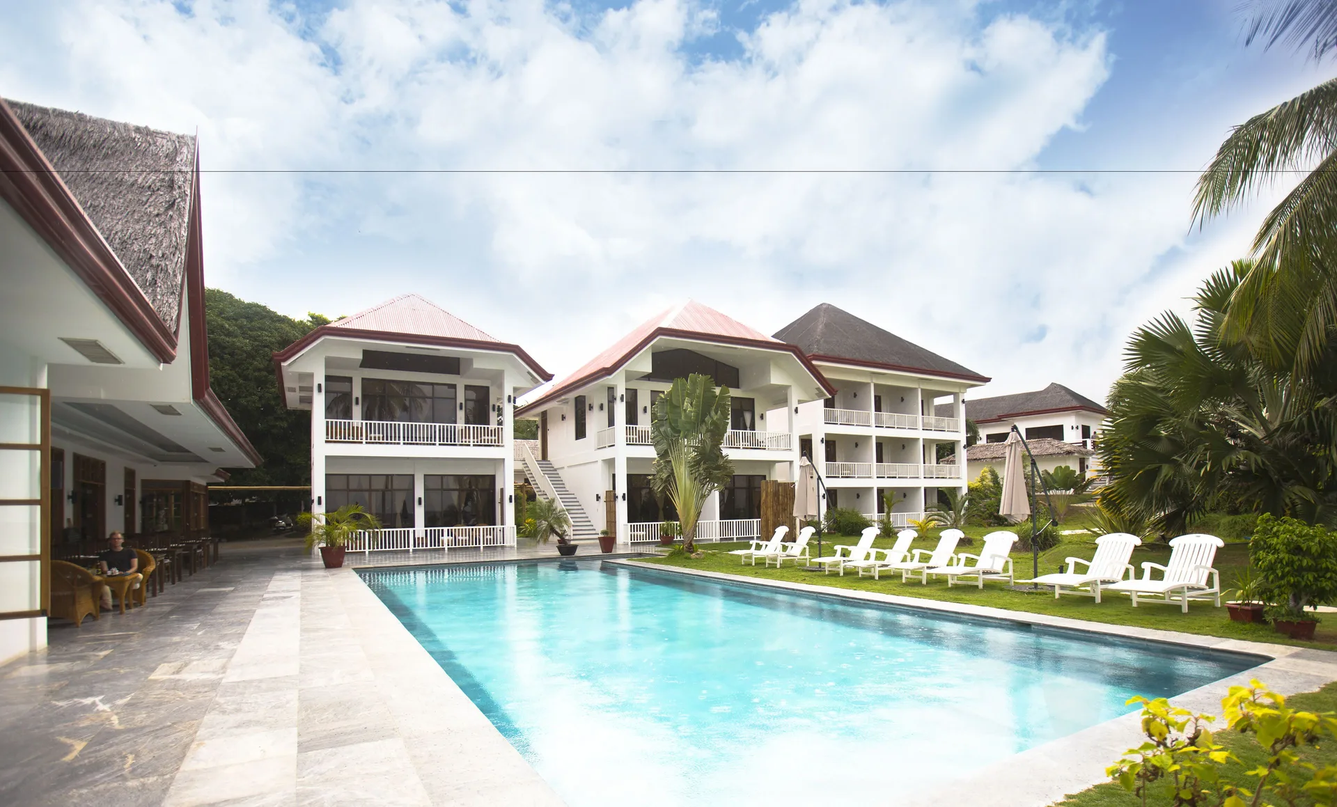 Sea Dream Resorts Dauin beachfront resort with ocean views tropical gardens and pool