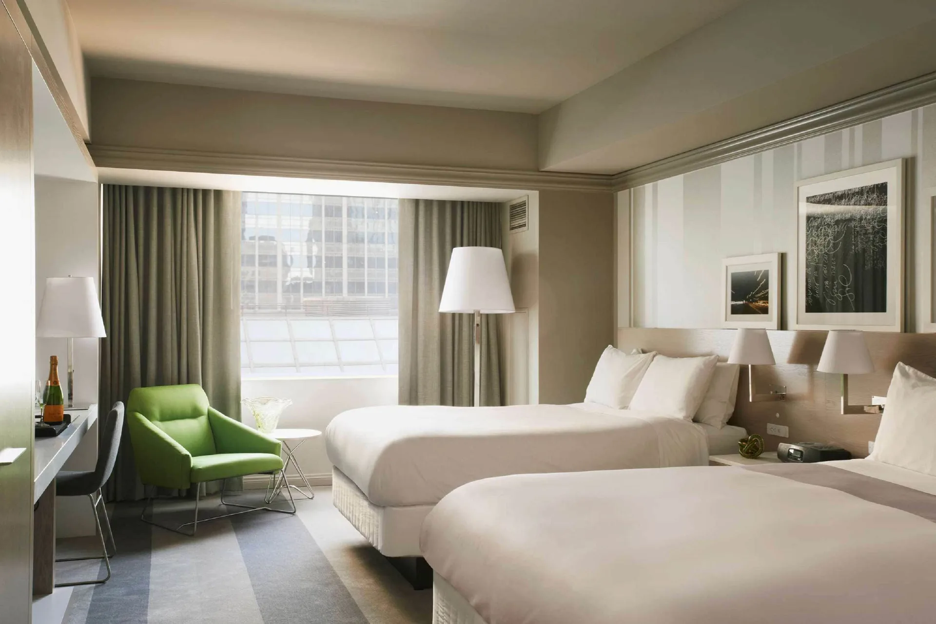 Room Business Class two beds and window view at Royal Sonesta Minneapolis Downtown with enhanced workspace, modern amenities, and downtown Minneapolis skyline views.