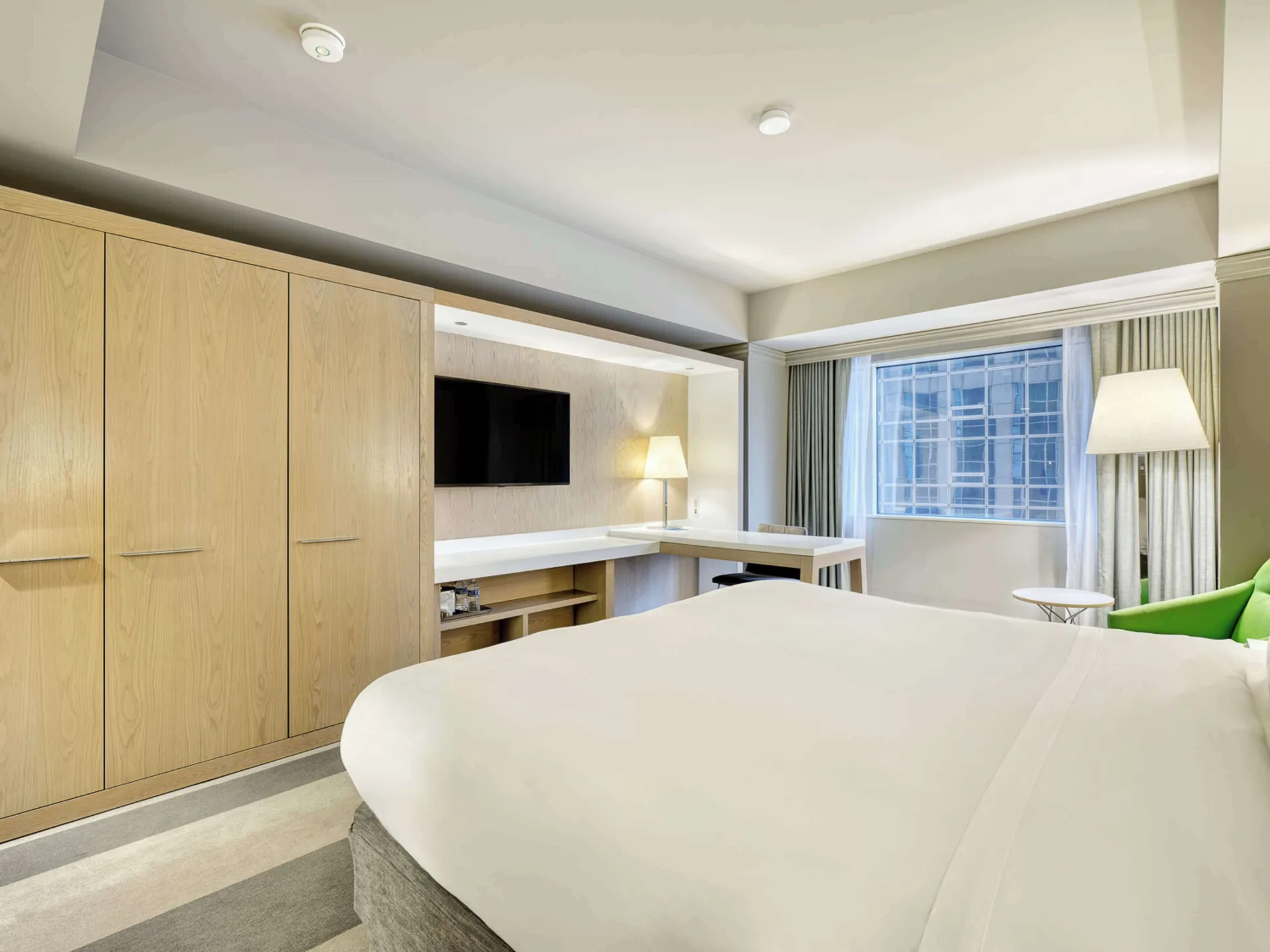 Room Preferred king bed and window seating at Royal Sonesta Minneapolis Downtown with modern design, comfortable amenities, and downtown Minneapolis location.