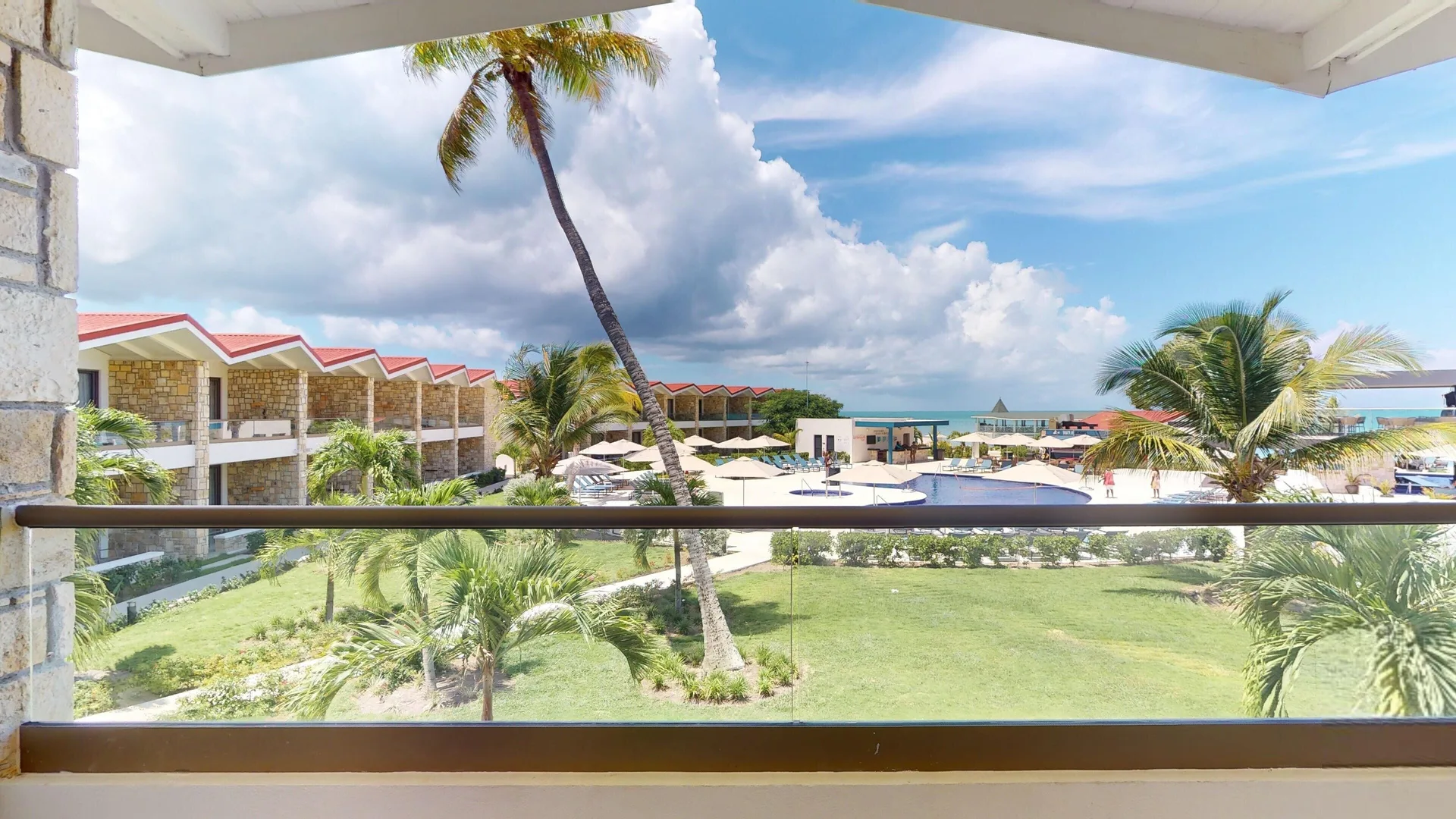 Balcony view from a Luxury Garden View Room Diamond Club at Royalton CHIC Antigua.