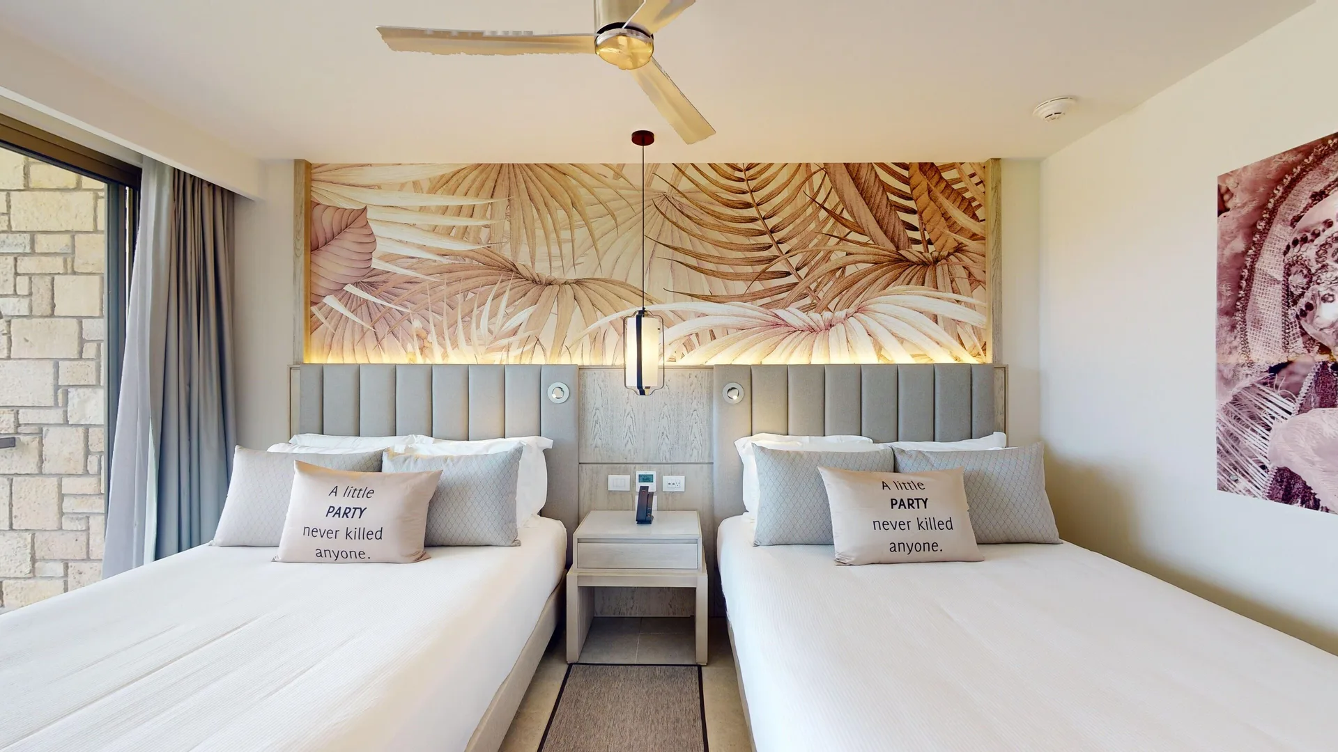 Two queen beds in a Luxury Garden View Room Diamond Club at Royalton CHIC Antigua.