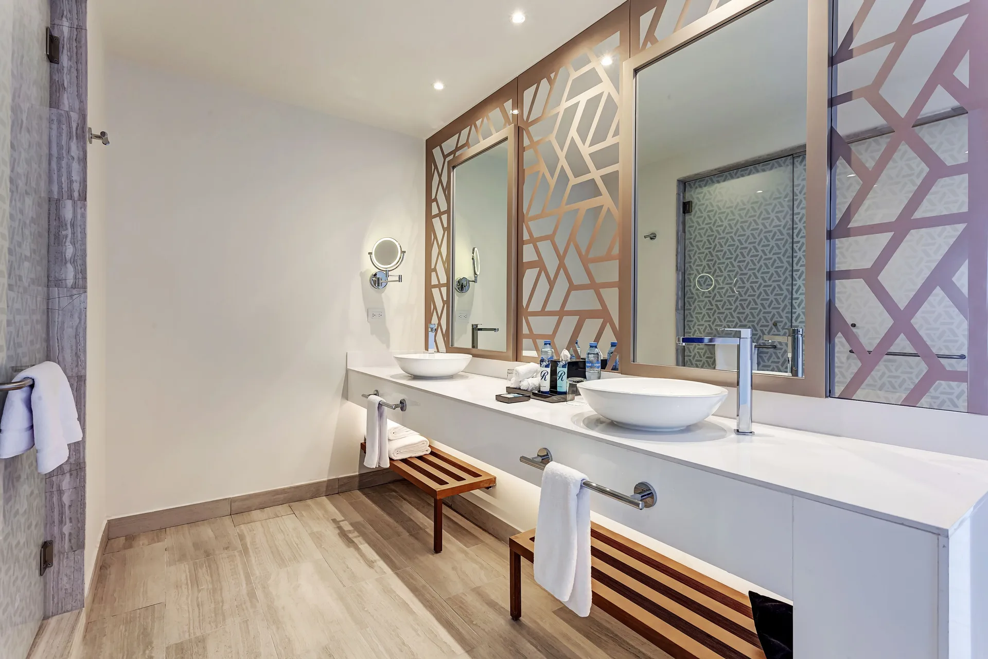 Luxury Garden View Room bathroom with double vessel sinks at Royalton CHIC Antigua.