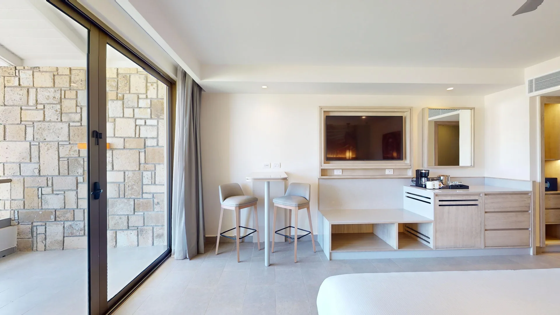 Luxury Ocean View Room workspace and balcony doors at Royalton CHIC Antigua.