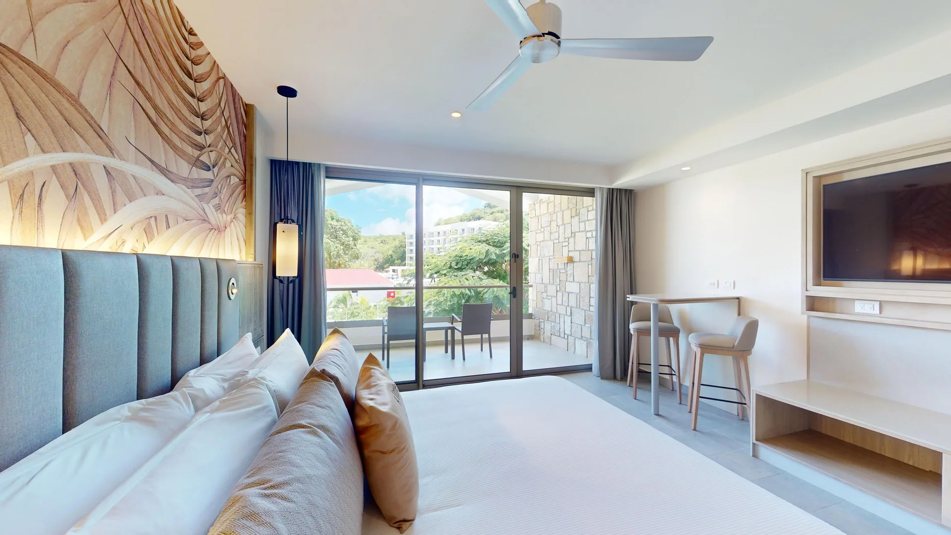 Luxury Ocean View Room with king bed and balcony at Royalton CHIC Antigua.
