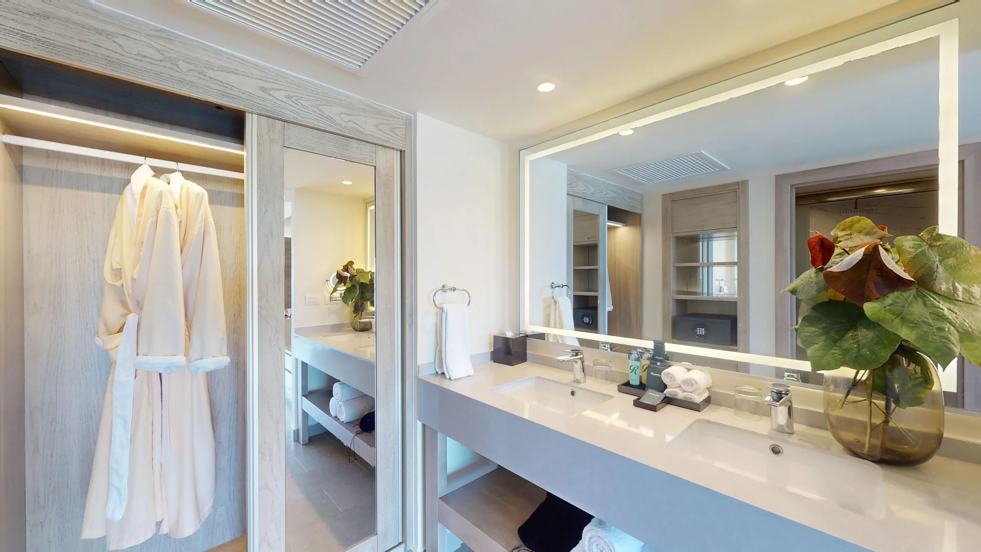Presidential suite double vanity and robe closet at Royalton CHIC Antigua.