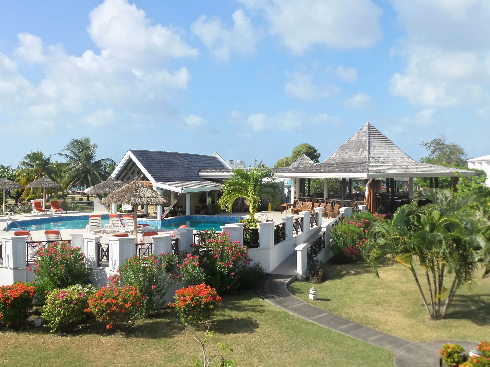 Coyaba Beach Resort Grand Anse beachfront Grenada resort with tropical gardens and relaxed pools