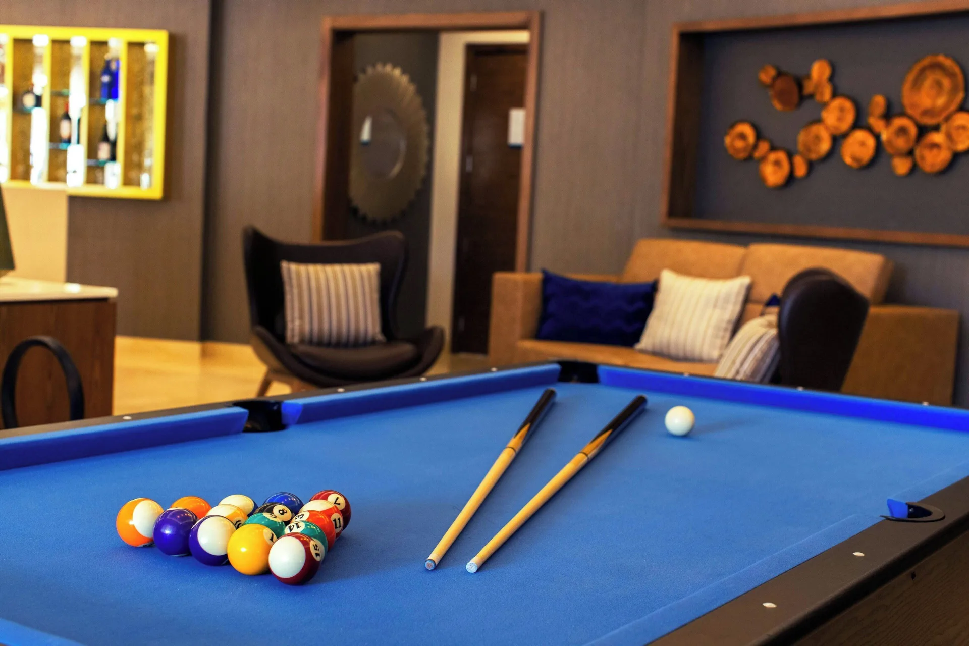 Chairman Two Bedroom Suite game room with blue pool table at Royalton Grenada.