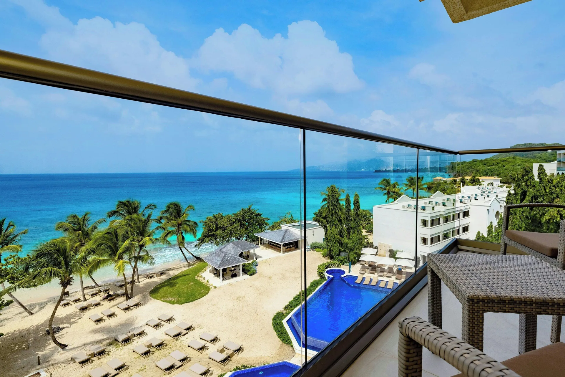 Oceanfront balcony view from a Luxury Junior Suite Ocean Front Diamond Club at Royalton Grenada.