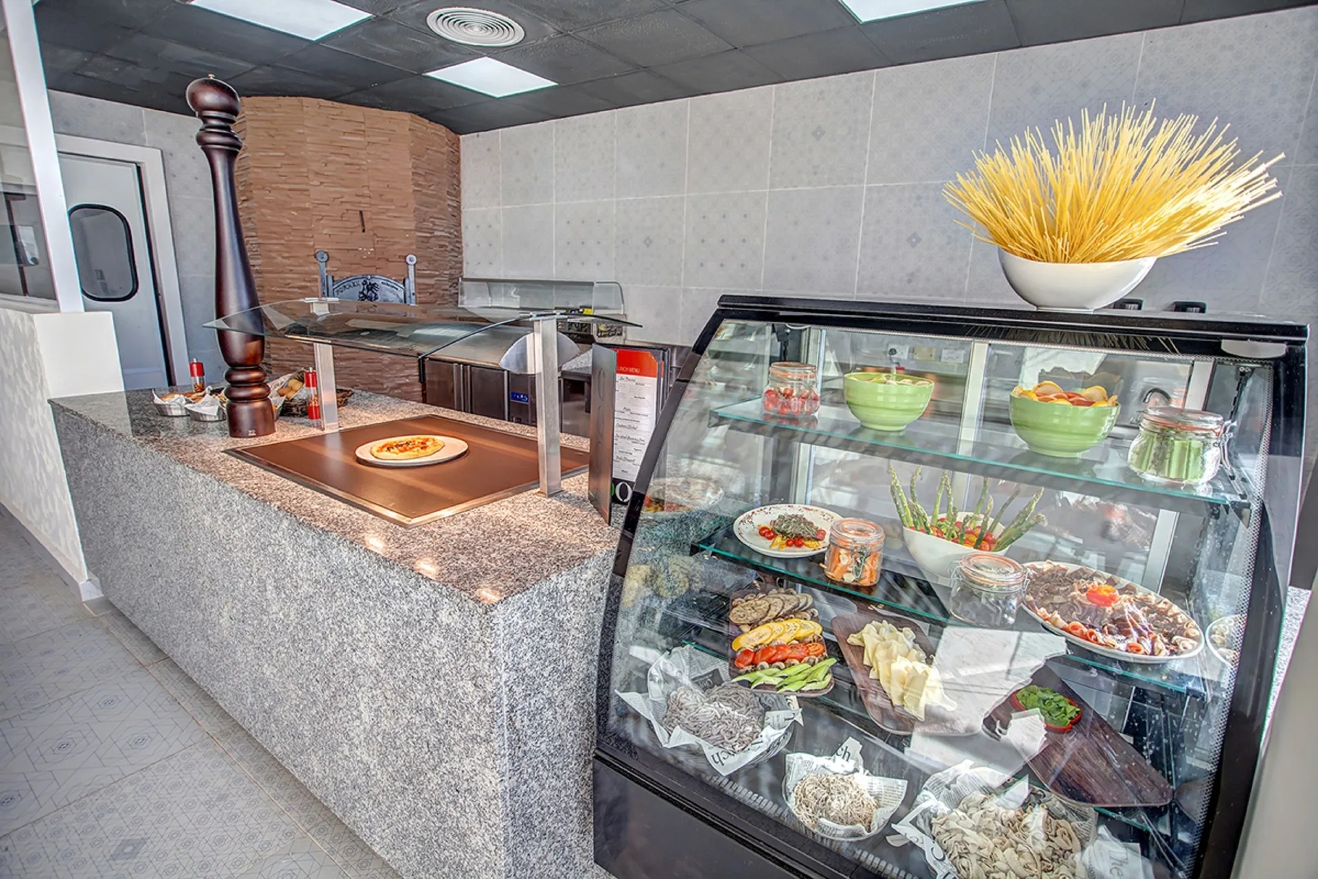 Pizza and appetizer display counter at Royalton Negril.