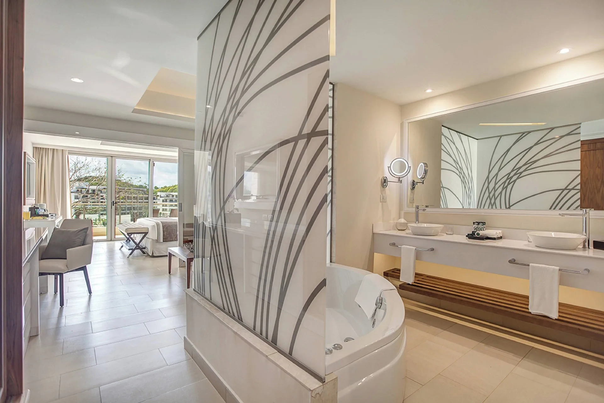 Luxury Family Suite Ocean View bathroom with tub and double vanity at Royalton Negril.