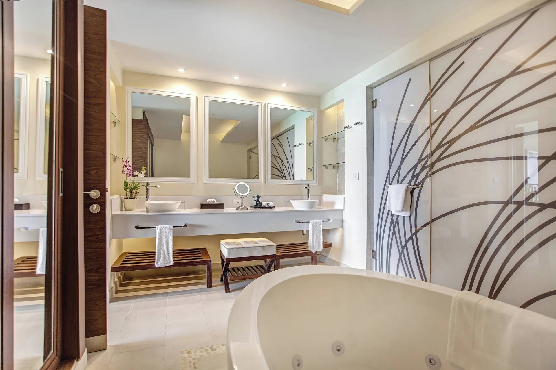 Penthouse suite bathroom with soaking tub and dual vanity at Royalton Negril.