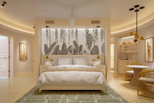 Mammee Bay Club Level Room with king bed and sitting area at Sandals Dunns River.