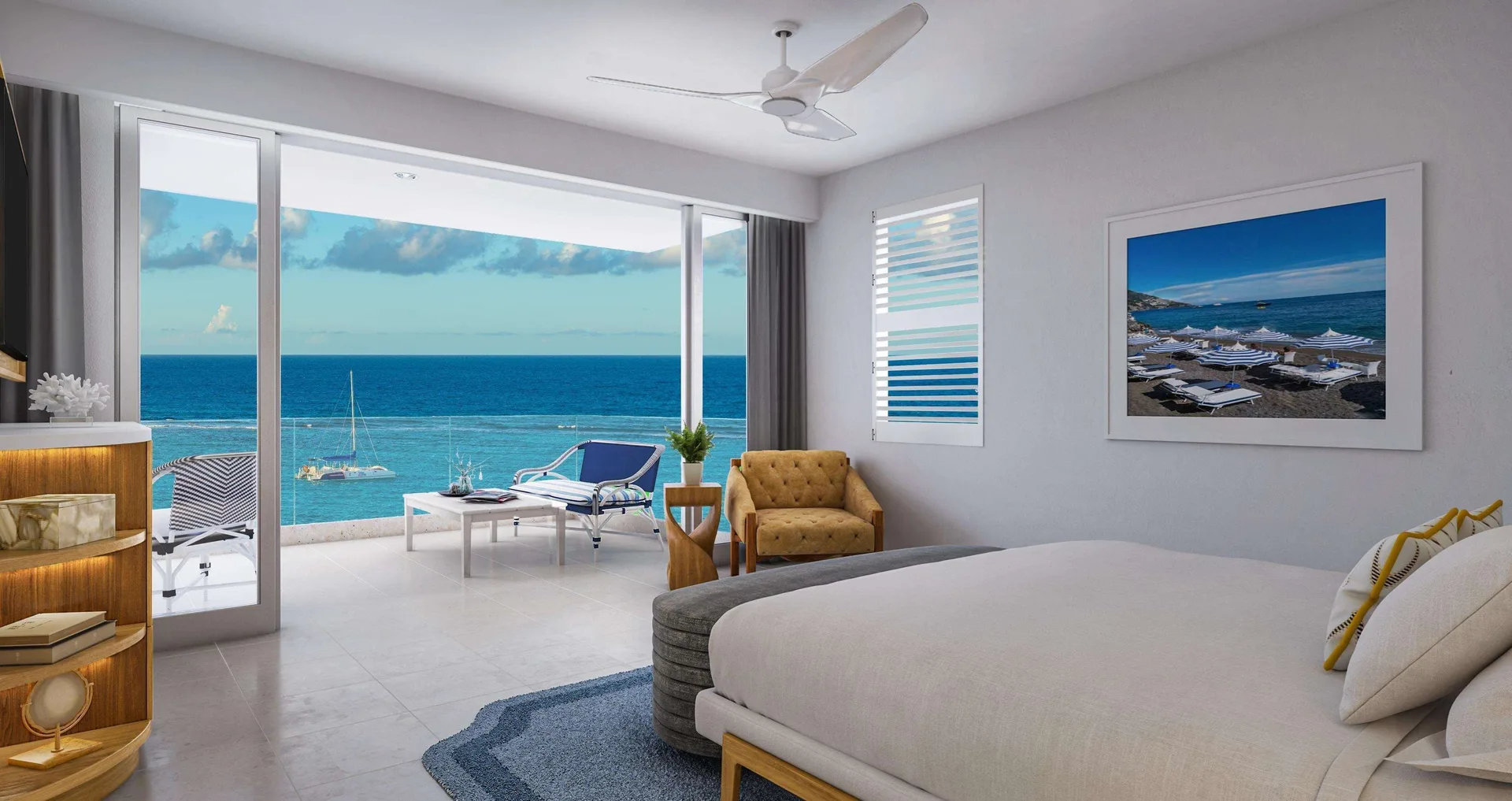 King bedroom opening to an oceanfront balcony at Sandals Dunns River.