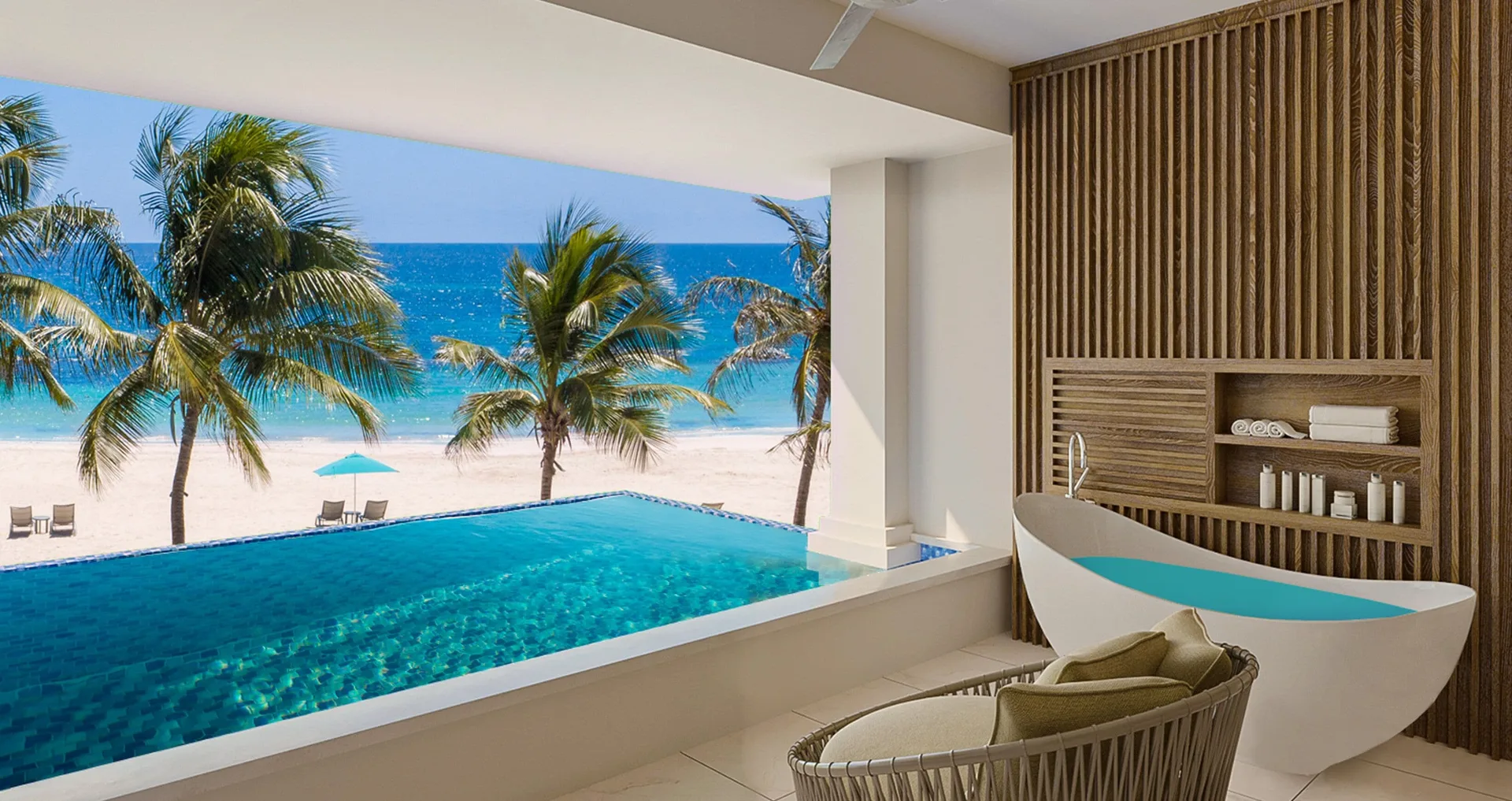 Beachfront balcony pool, seating, and soaking tub at Sandals Dunns River.