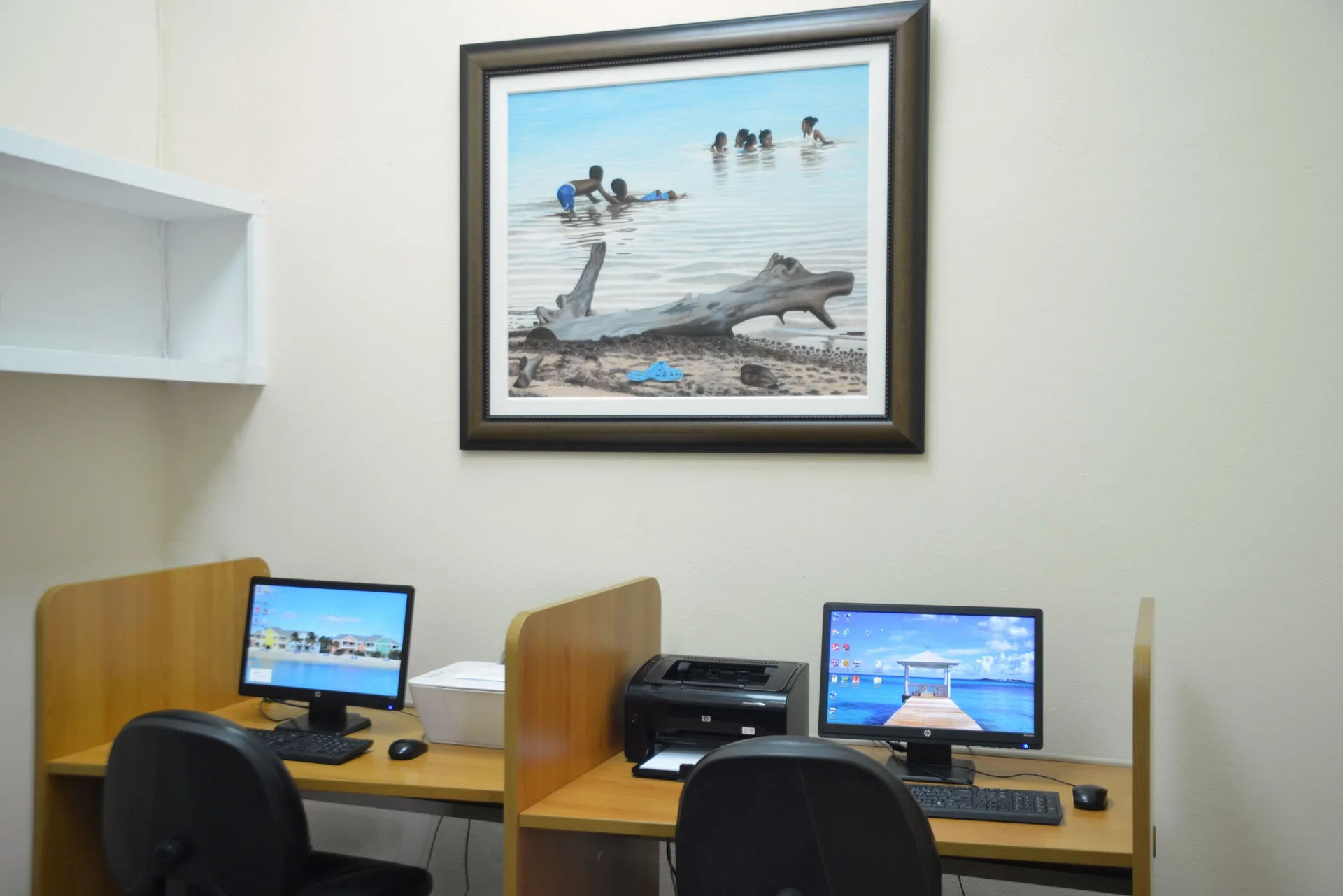 Computer workstations and printer in a business area at Sandyport Beach Resort.