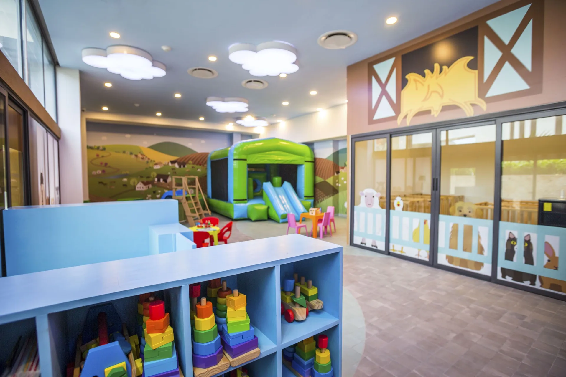 Kids club toy shelves and soft play area at Sensira Resort & Spa Riviera Maya.