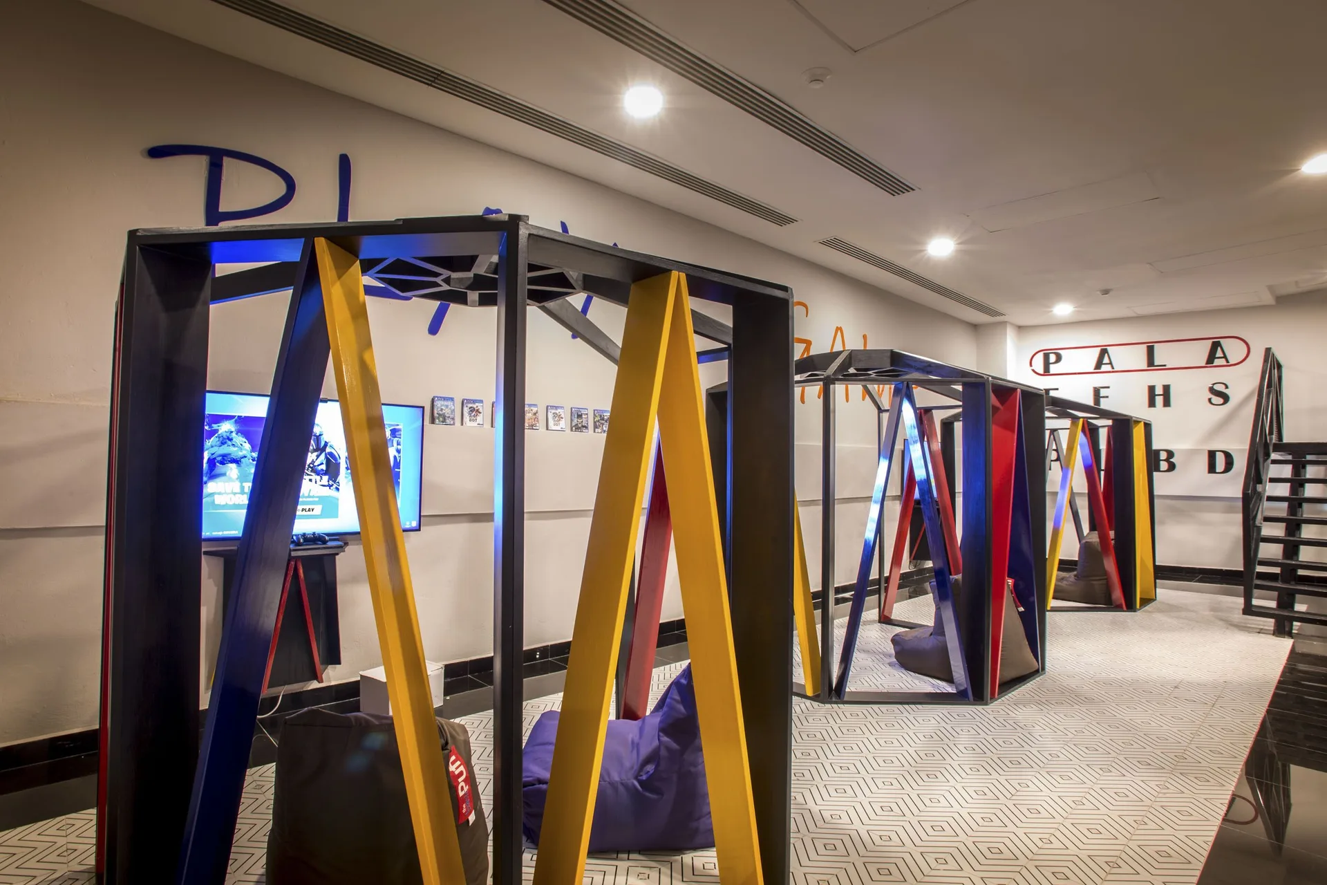Video game stations in the teens club at Sensira Resort & Spa Riviera Maya.