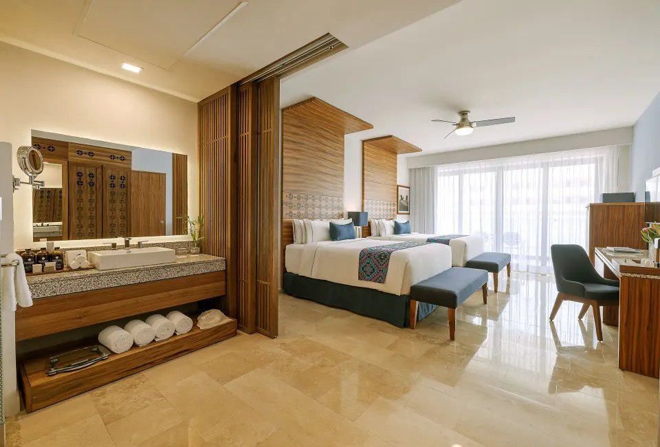Agatha two-bed room with open vanity area at Sensira Resort & Spa Riviera Maya.