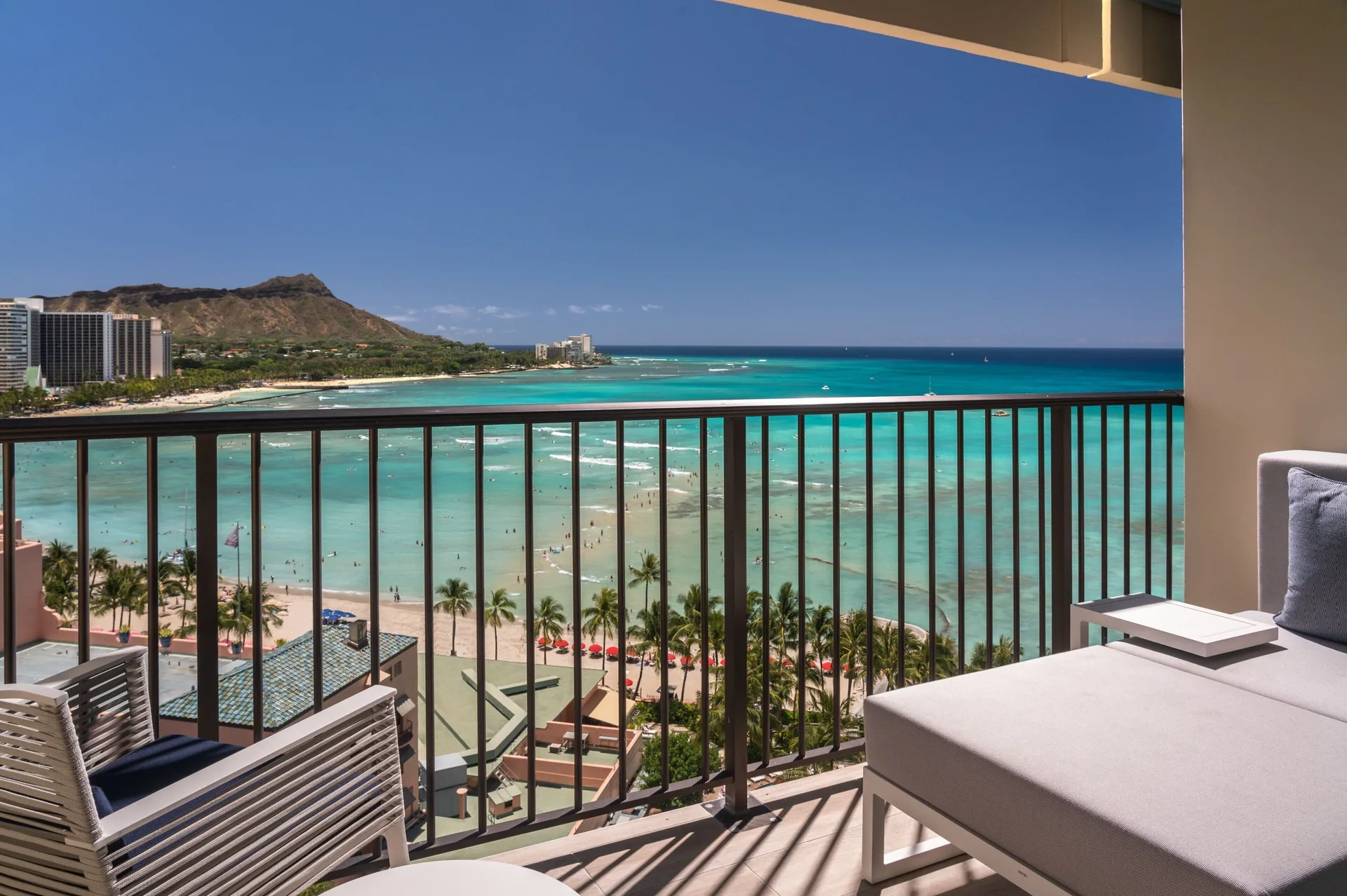 Balcony with Waikiki Beach and Diamond Head view at Sheraton Waikiki Beach Resort.